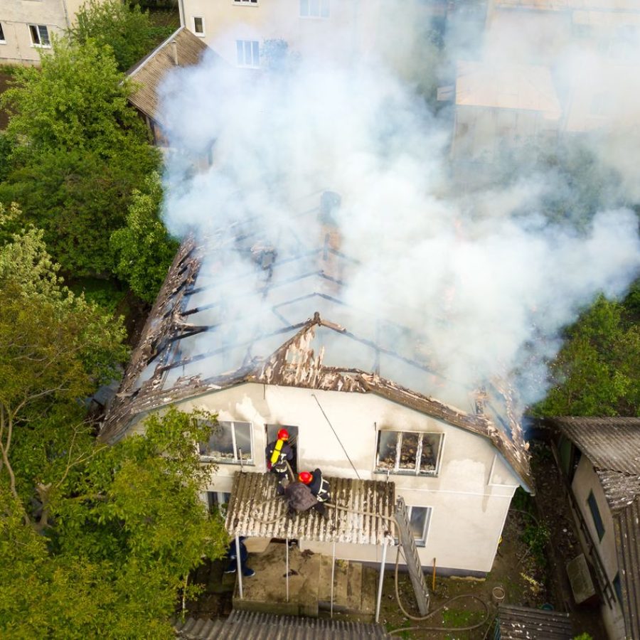 aerial-view-of-a-house-on-fire-with-orange-flames-2022-01-12-06-31-20-utc