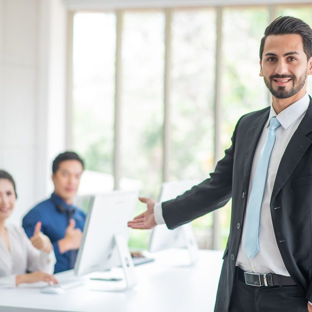 boss-or-manager-stand-and-welcome-to-office-backg-2022-03-24-00-58-05-utc