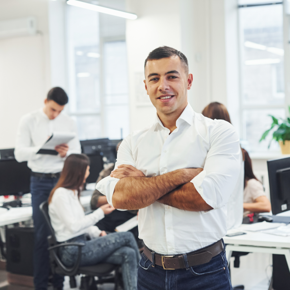 man-in-formal-wear-standing-in-the-office-against-2021-08-30-15-42-36-utc